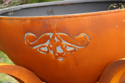 Africa’s Big Five fire pit during the day, showing close up of Cape Buffalo cut out and round bowl design.