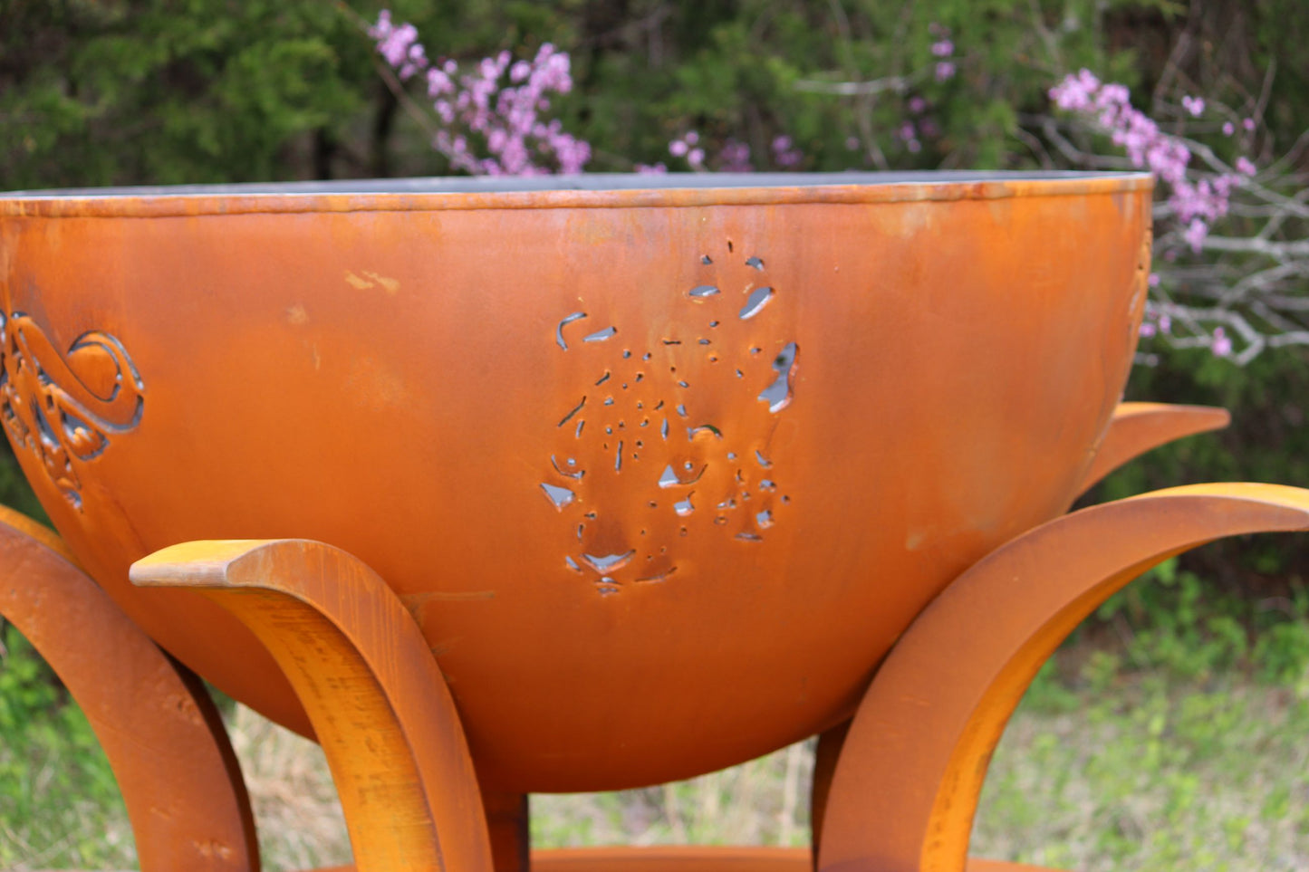 Close-up of leopard cutout on Africa’s Big Five fire pit in natural daylight.