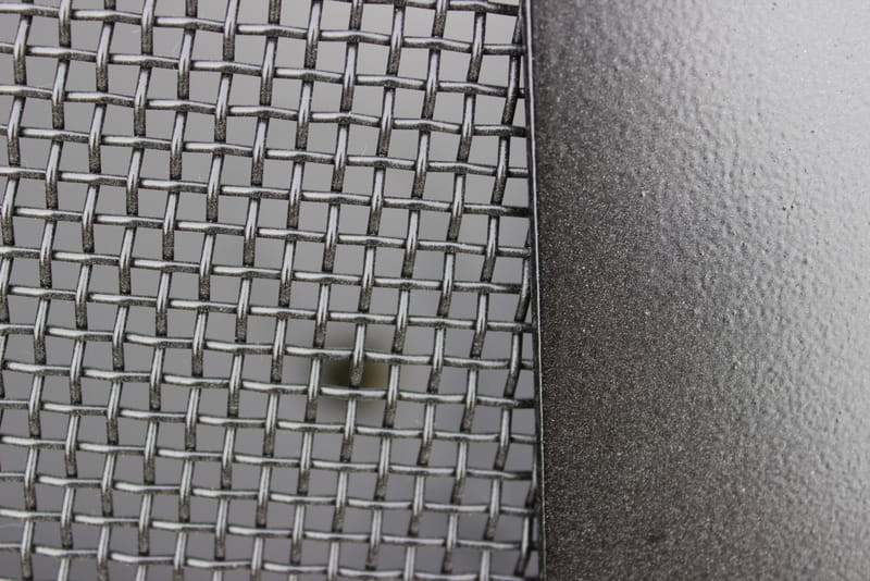Close-up of stainless steel mesh of 40” Spark Guard. Fits Fire Pit Art style: Nepal (sold separately).