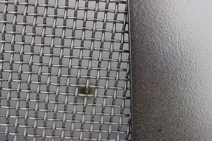 Close-up of stainless steel mesh of 40” Spark Guard. Fits Fire Pit Art style: Nepal (sold separately).