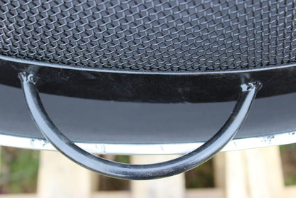 Close-up of steel carrying handle on the side of 44.5” black heavy stainless steel mesh Spark Guard by Fire Pit Art (fits Bella Vita 46” and Asia 48 , each sold separately).