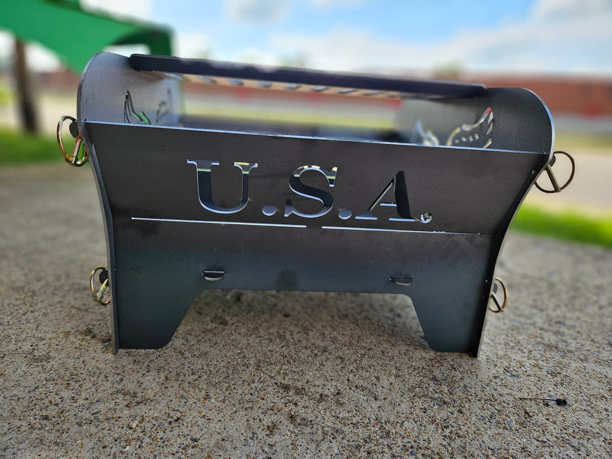 Side view of Freedom steel collapsible fire pit with &