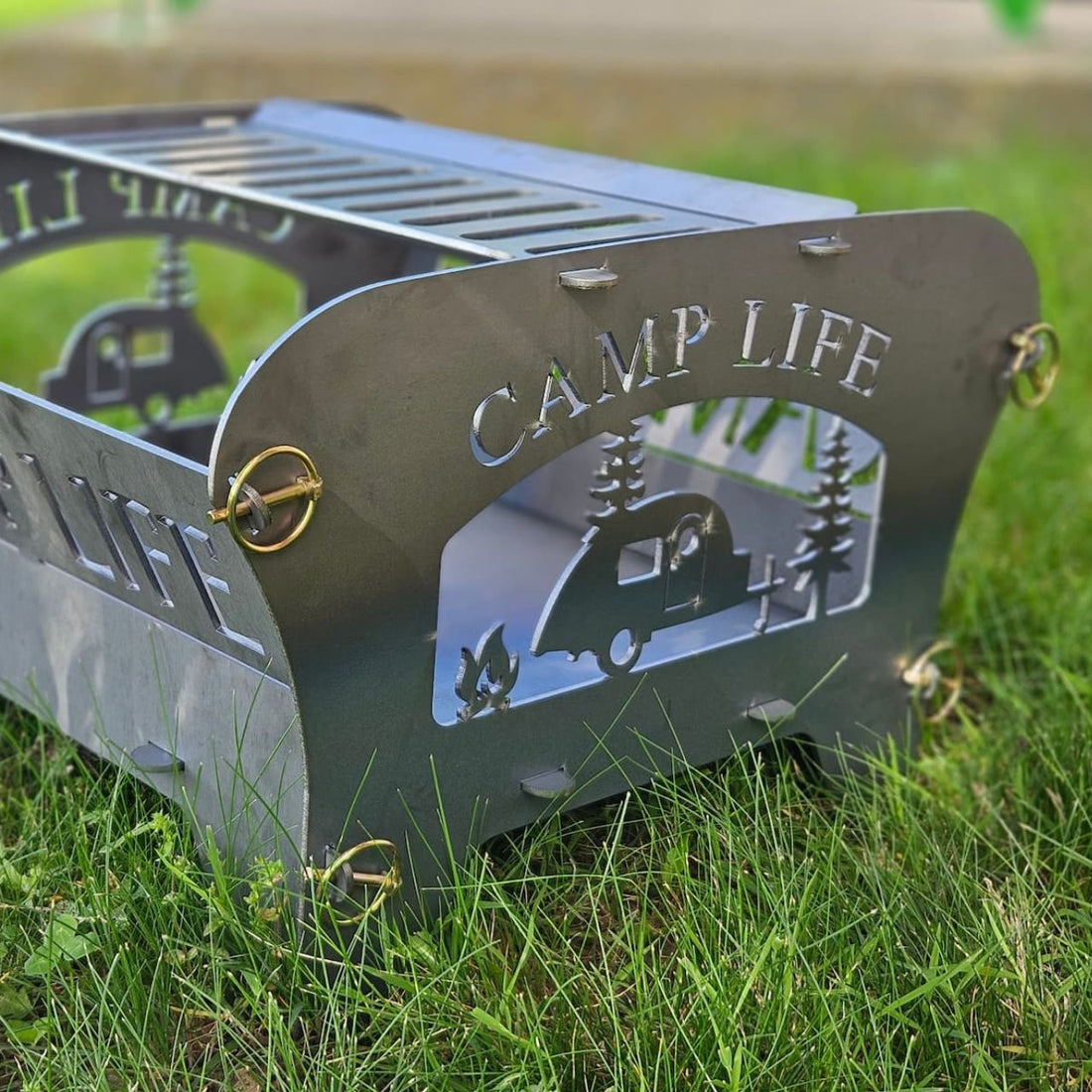 A collapsible steel fire pit with &