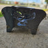 A collapsible metal fire pit with an eagle cut-out design, featuring &