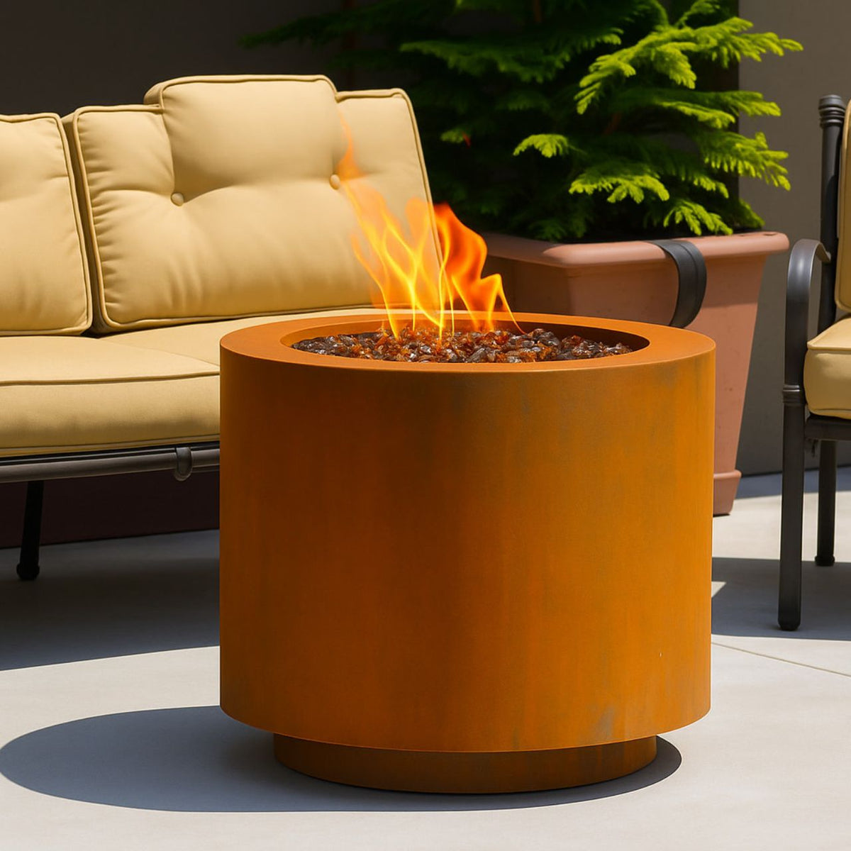 Beverly Corten Steel Propane Fire Pit on a patio surrounded by tan outdoor chairs with cushions.