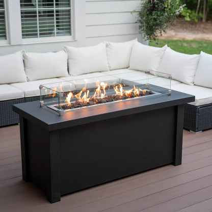 Lit Carolina Evening Companion Linear propane fire pit table in Endura Graphite on a patio.  Made in the USA.  Wind shield sold separately.