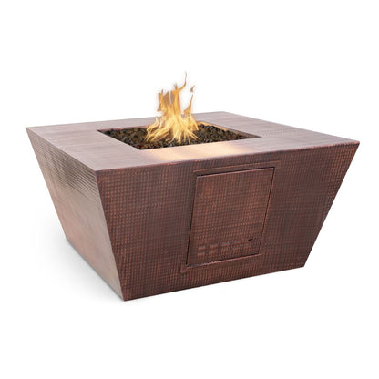 Redan Square Metal Fire Pit in Hammered Copper — angled view with flame.